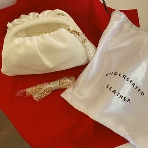 Understated leather clutch/ bag